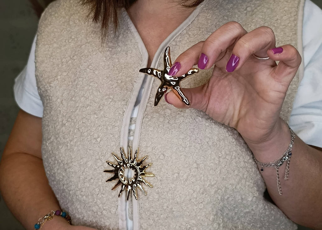 Gilet sans manche avec broches